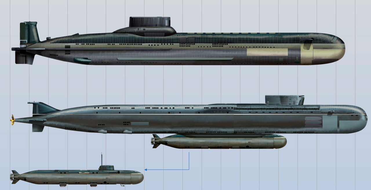 АПЛ проекта 09852 (в центре) - самая большая из когда-либо построенных в России. Однако её водоизмещение уступает аналогичному параметру лодок проекта 941 «Акулы». В нижней части изображения - атомная станция АС-12 «Лошарик».