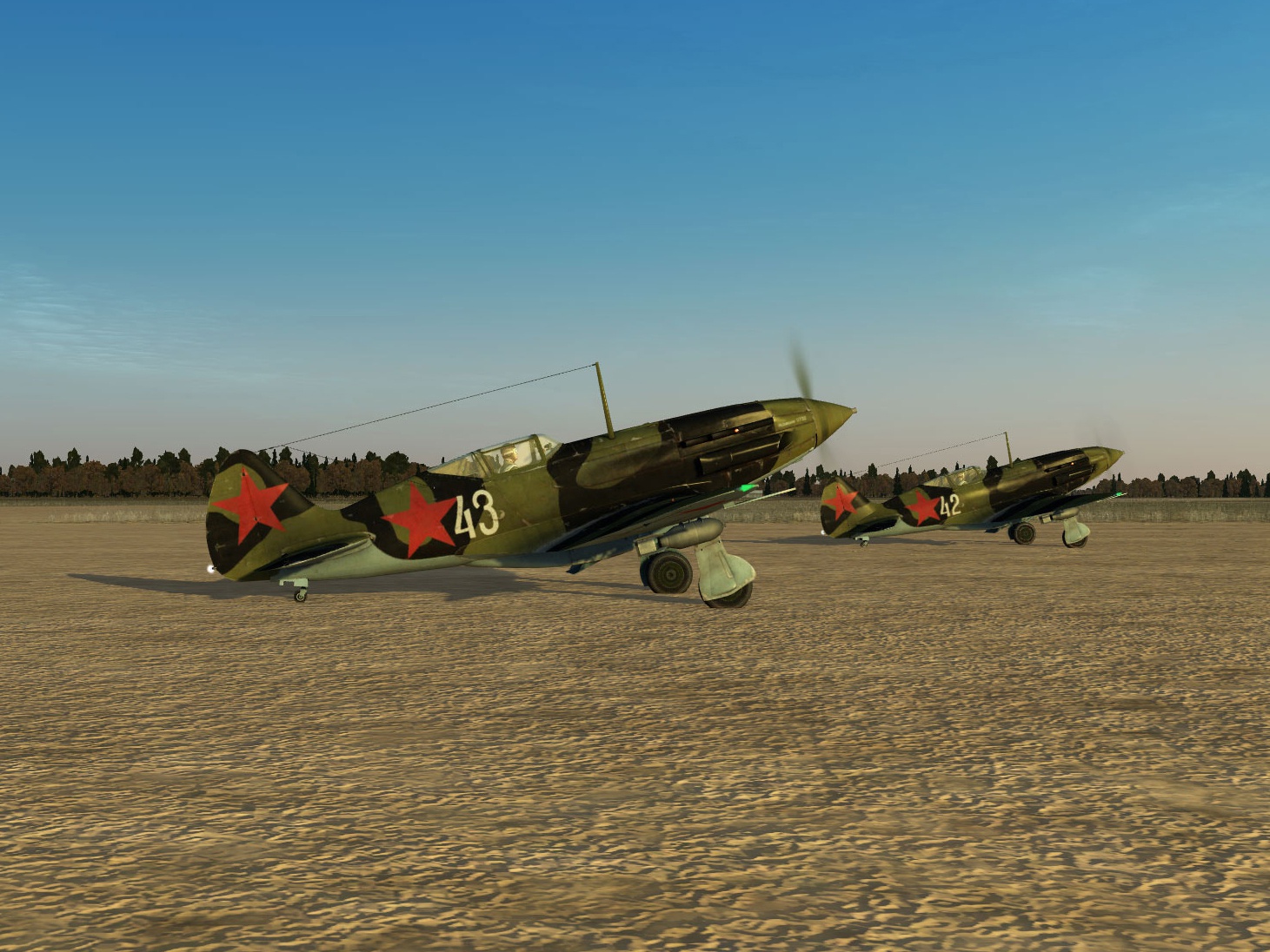 Скриншоты из российской компьютерной игры «Ил-2 Штурмовик». Данные варианты текстур, воссоздающие исторические окраски самолётов, выполнены Максимом Брянским