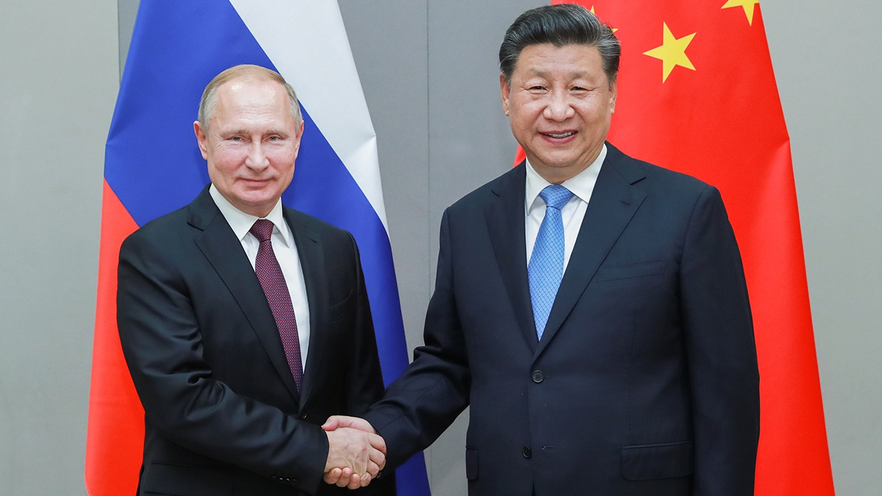 Путин первым поздравил Си Цзиньпина с переизбранием на должность председателя КНР